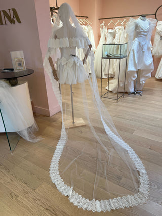 Cathedral-length bridal veil with scalloped lace trim and sheer blusher layer