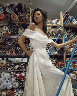 Vivienne Westwood made-to-order gown in floral crepe jacquard showcasing heritage design, artisanal draping, and timeless elegance