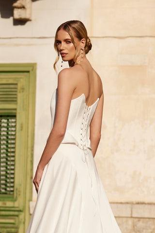 Mia Lavi strapless satin top highlighting couture structure, artisanal tailoring, and timeless elegance from the designer’s luxury bridal collection
