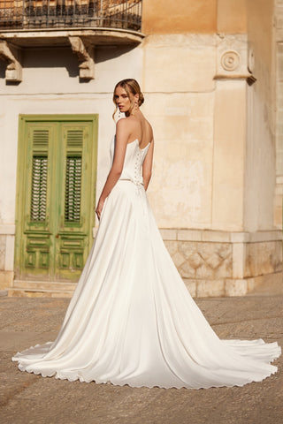 Mia Lavi A-line crepe satin skirt showcasing couture tailoring, minimalist elegance, and the brand’s renowned European craftsmanship