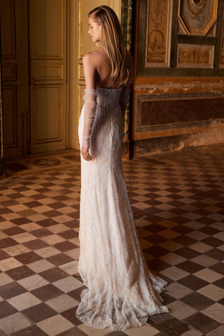 Mia Lavi handcrafted couture gown highlighting intricate lace detailing, expert tailoring, and enduring bridal design heritage.