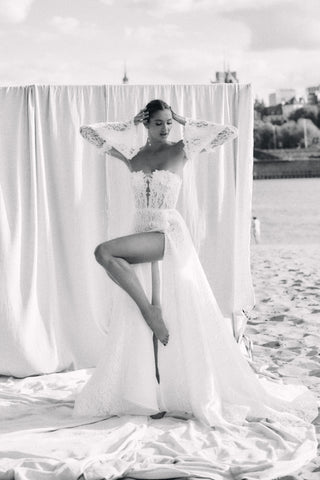 Mia Lavi designer bridal dress showcasing intricate lace craftsmanship, structured corsetry, and timeless couture artistry