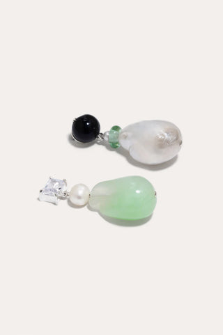 Designer earrings with an intricate fusion of pearls, resin, and zirconia, perfect for high-fashion moments.