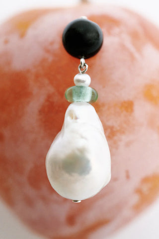 Exquisite earrings featuring a balance of modern design and natural elements for exclusive collections.