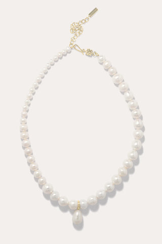 Luxurious necklace with freshwater pearls and zirconia accents, elegantly handcrafted on a delicate vermeil chain for formal evening wear.