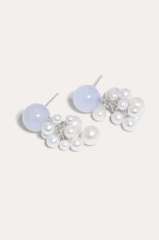Sophisticated earrings with a unique, artistic form, blending sustainable materials and exquisite craftsmanship for a bold evening look.