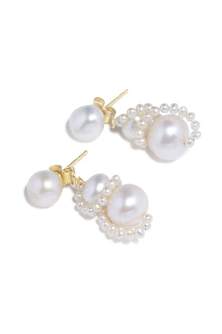 Luxury freshwater pearl earrings with intricate wrapped detailing, a contemporary take on a classic design, perfect for formal and high-fashion occasions.