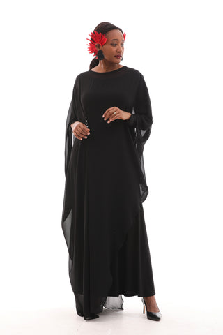 Flowing caftan-inspired maxi dress with cape sleeves and delicate beaded accents at the waist and sleeves