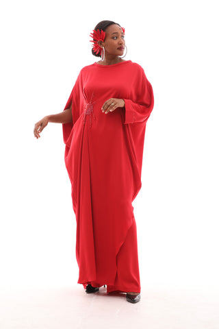 Flowing maxi caftan evening set with a relaxed silhouette, round neckline, and luxurious beaded embellishments at the waist.