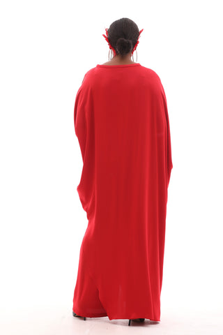 Designer caftan-style formal wear with a fluid fit, round neckline, and intricate beading at the sleeve edges and waist.