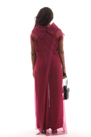 Chic jumpsuit featuring a flowing organza overlay, back zip, and ethereal silhouette for formal occasions.