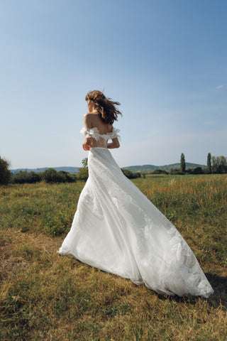Daalarna couture tulle gown with artisanal construction, bespoke A-line silhouette, and made-to-order exclusivity