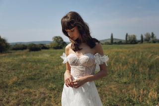 Daalarna luxury bridal design featuring couture heritage craftsmanship and artisanal 3D organza floral appliqués