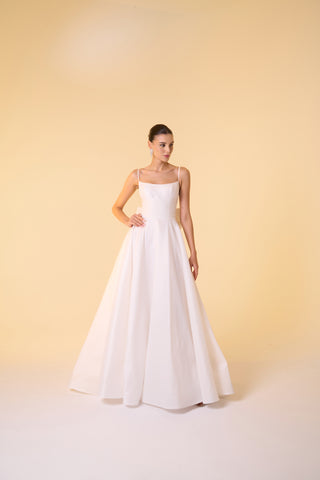 Designer A-line gown with scoop neckline and tailored waist, perfect for sophisticated occasions