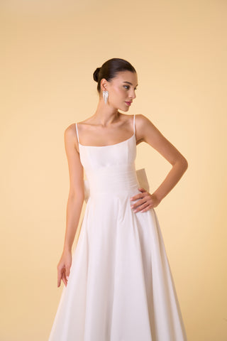 Taffeta evening dress with spaghetti straps and an elegant silhouette designed for formal events