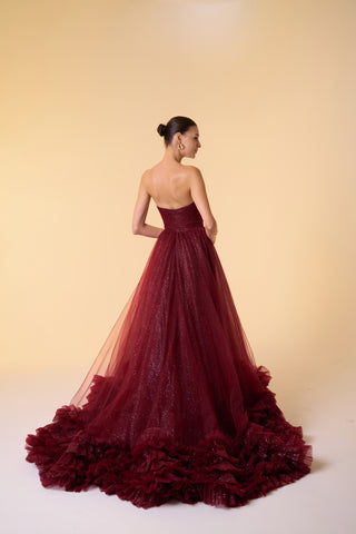 Sleeveless ball gown with fitted bodice, voluminous silhouette, and dazzling embellishments perfect for formal occasions