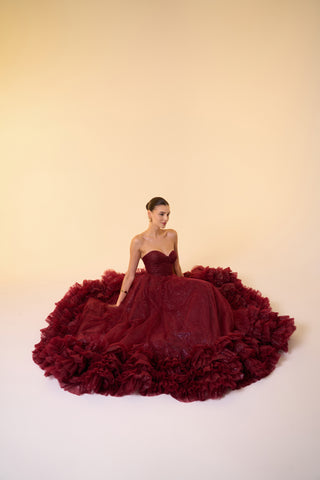 Maxi tulle ball gown with sleeveless design, sweetheart neckline, and statement ruffled hem for a glamorous event look