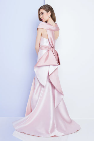 Sculpted mermaid evening gown with off-shoulder neckline, thigh-high slit, and dramatic back drape detail