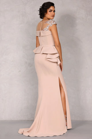 Luxury formal dress with asymmetric floral embellishments and elegant maxi-length silhouette