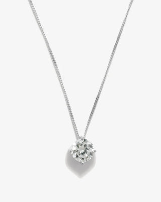 Timeless statement piece with a delicate silver chain and a dazzling zirconia pendant, embodying modern craftsmanship and sustainable elegance