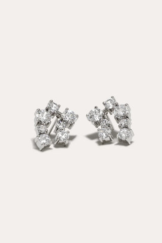 Modern luxury earrings with a fluid, sculptural design, showcasing exquisite craftsmanship and sustainable materials.