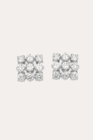 Sculptural earrings featuring a dynamic, clustered design of cubic zirconias set in sustainable recycled silver for an elegant evening look.