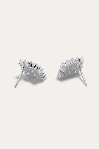 Handcrafted designer earrings with a modern, artistic silhouette, showcasing sparkling cubic zirconias in a timeless, luxurious setting.