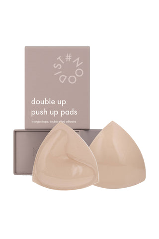 Double Up Triangle Push-Up Pads by Nood, offering a seamless 2-cup size boost, perfect for wearing under V-cut tops at formal events.