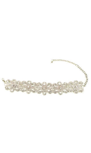 Silver beaded necklace on a white background