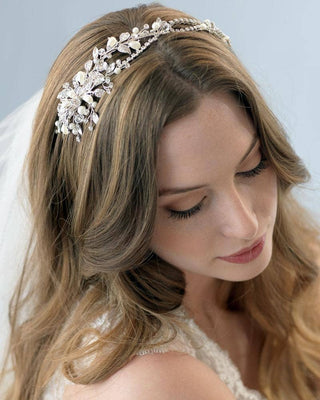 Woman wearing a decorative headband with a soft focus background