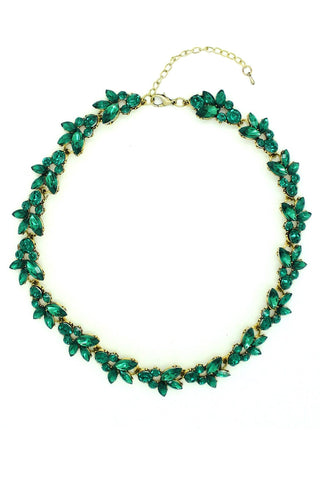 Green leaf-shaped necklace on a white background