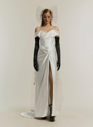 Full body front view of the Mabel gown styled with black gloves, emphasizing the sophisticated silhouette.