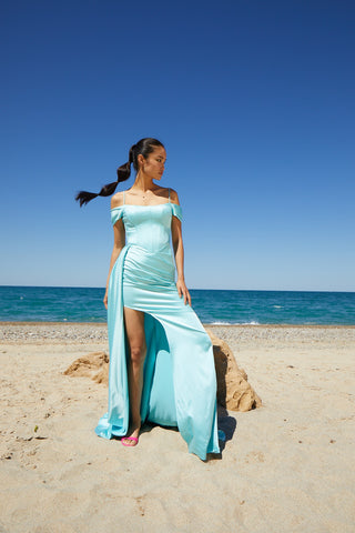 Glamorous satin gown with spaghetti straps, adjustable corset, and elegant overskirt for a timeless formal look.