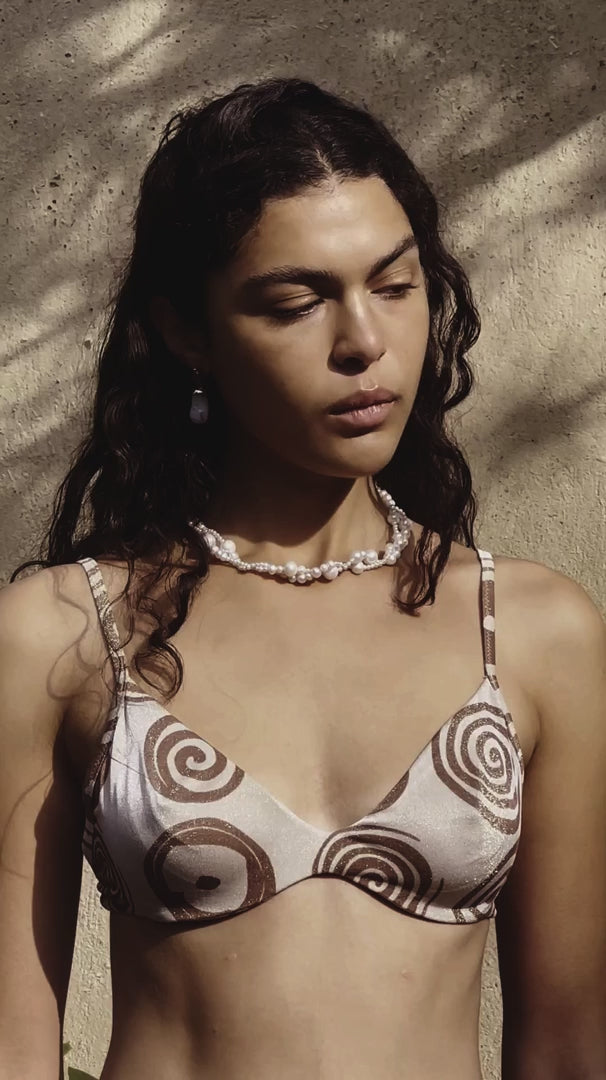 Recycled silver earrings with an intricate sculptural form, highlighted by agate and resin elements.