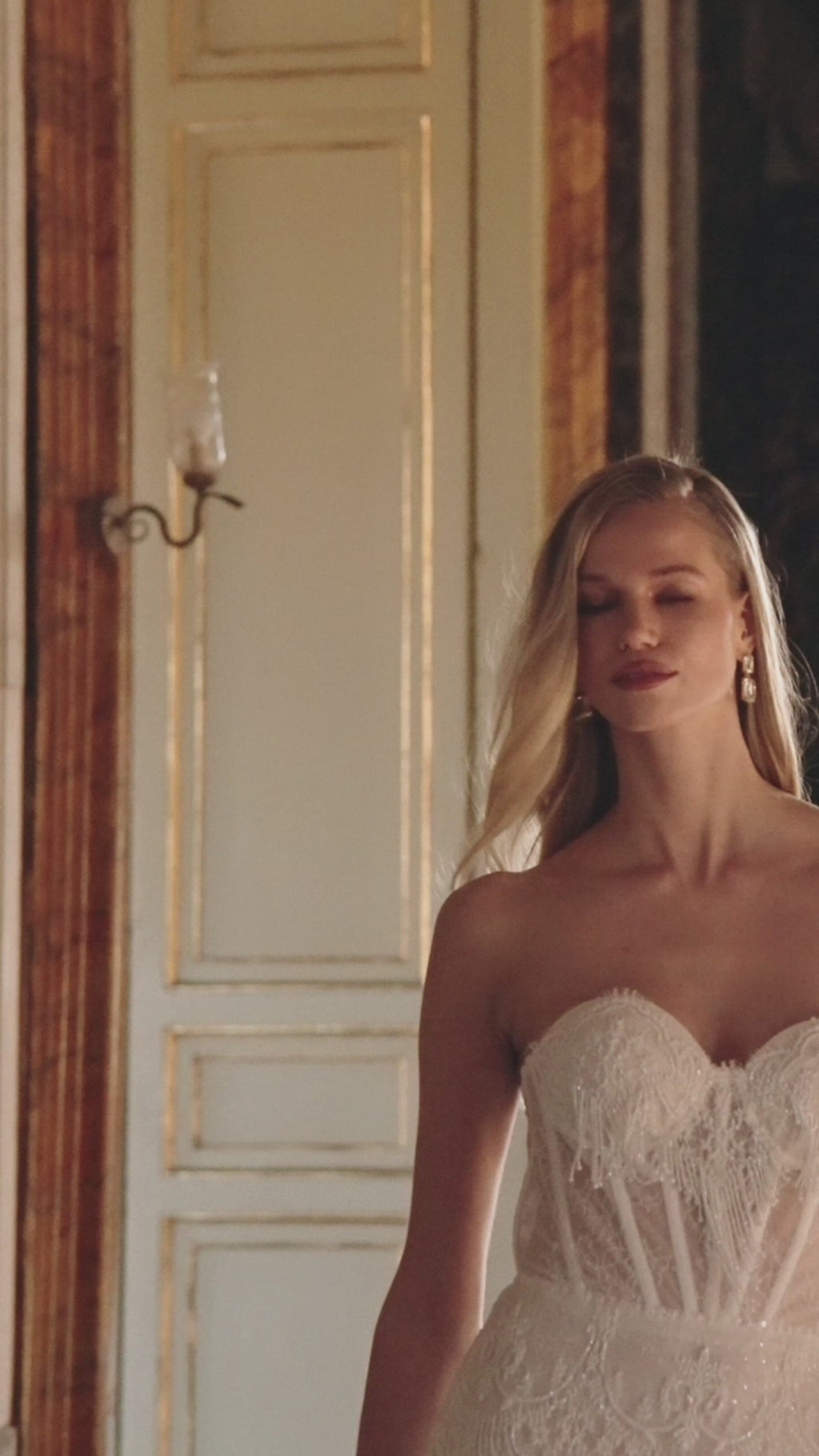 Mia Lavi couture bridal creation with transparent boning, premium lace, and hand-applied pearl embellishment