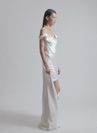 Vivienne Westwood bespoke bridal design in pearl white silk satin with sculptural neckline and heritage-inspired detailing