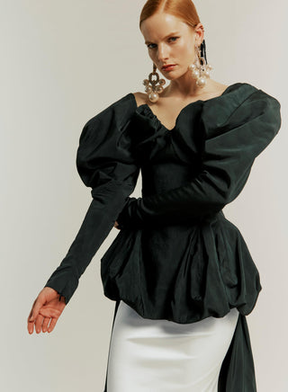 Black Raven Corset styled with black Elizabeth sleeves, showcasing an elegant and dramatic bridal look