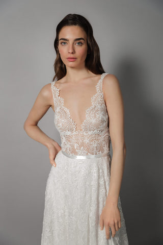 Daalarna bespoke couture gown in ivory beaded lace, showcasing signature design heritage and artisanal bridal artistry