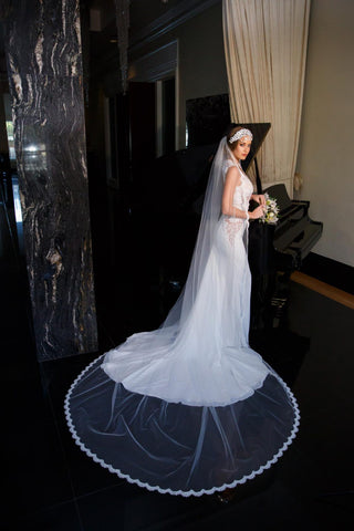 Cathedral length ivory veil with lace edging